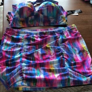 Torrid swim top 0X and swim skirt 2X.